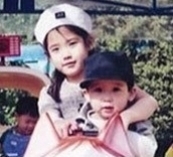 IU and her little brother‘s cute childhood photo revealed