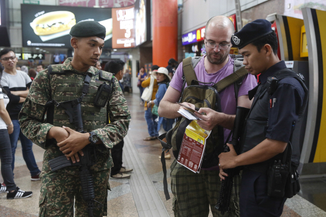 Malaysia Militant Attack <YONHAP NO-2578> (AP)