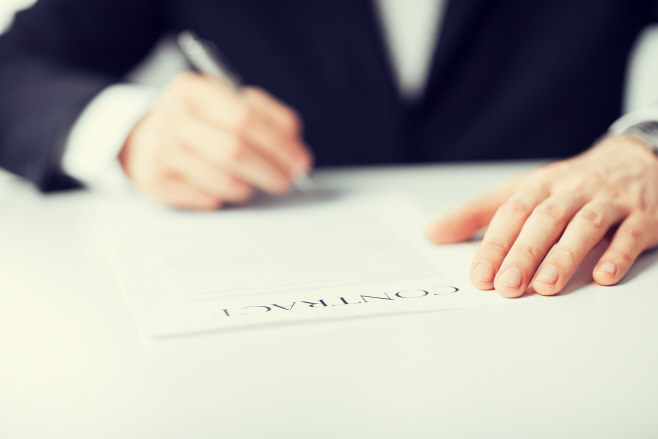 man with contract