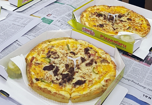 예산 위해 고생한 기재부 직원 격려…문 대통령이 보낸 피자