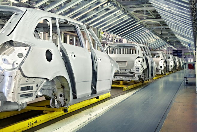 cars in a row at car plant
