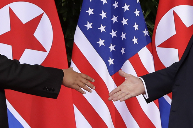 Trump Kim Summit Day in Photos <YONHAP NO-3896> (AP)