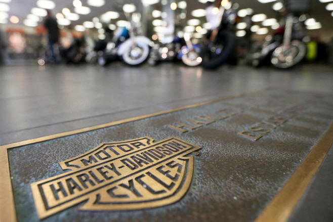 Earns Harley Davidson
