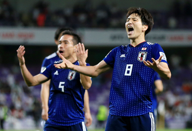SOCCER-ASIANCUP-IRN-JPN/ <YONHAP NO-0226> (REUTERS)