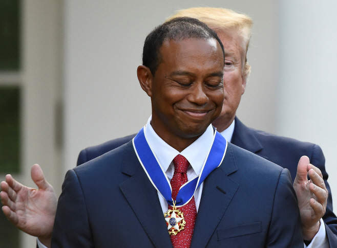 USA-TRUMP/TIGERWOODS <YONHAP NO-1427> (REUTERS)