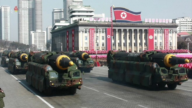 북한, 전원회의 영상에 ICBM 등 과거 무기사진 공개