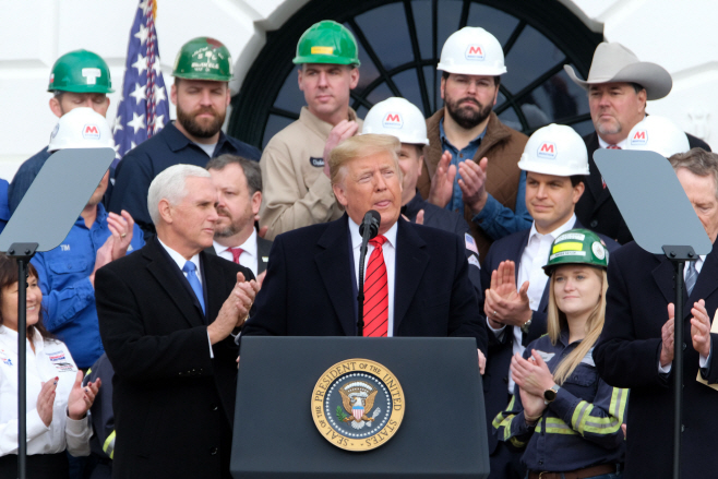 PRESIDENT TRUMP SIGNS TRADE AGREEMENT