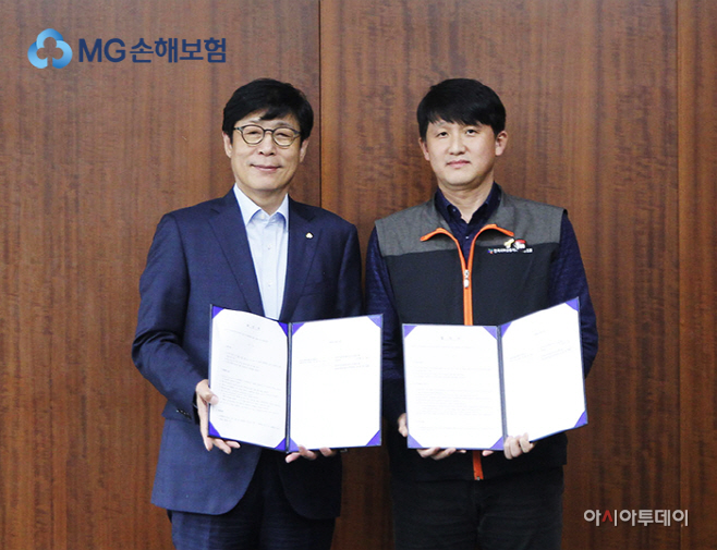 1. MG손보 박윤식 대표이사(좌) 김동진 위원장(우)의 습