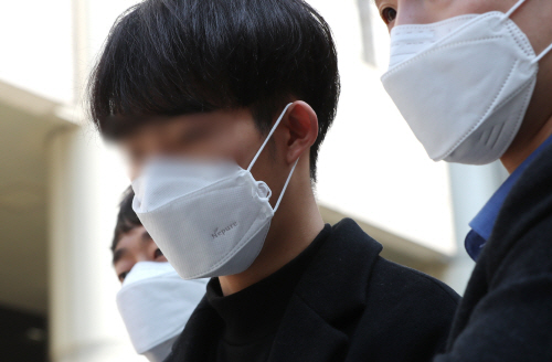 영장실질심사 마친 공익요원 최모씨<YONHAP NO-3118>