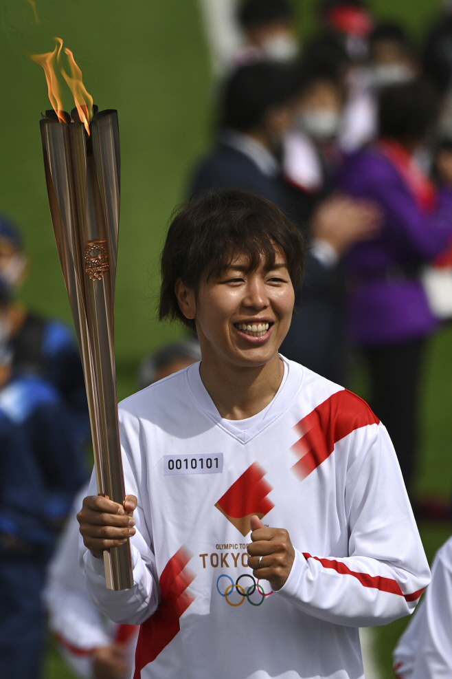 Olympics Tokyo Torch Relay Start <YONHAP NO-3613> (AP)