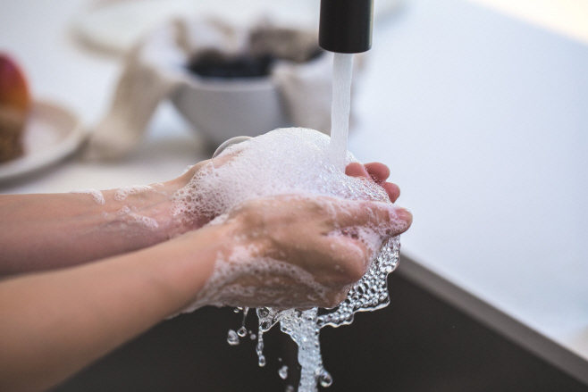 person-washing-hands