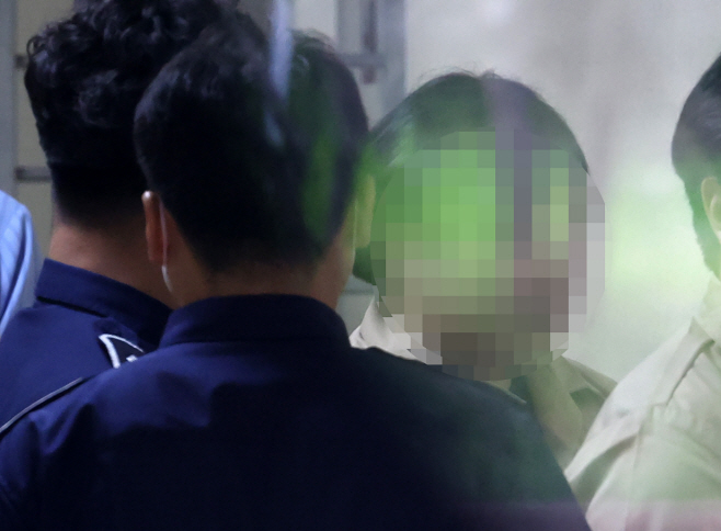 부산 돌려차기 항소심서 20년 선고<YONHAP NO-3038>