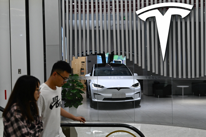 FILES-CHINA-US-AUTOMOBILE-EARNINGS-TESLA