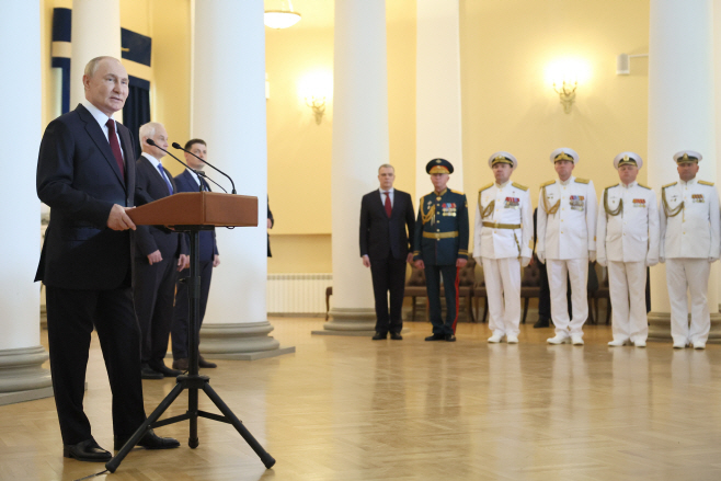 Russia's President Putin meets leaders of international delegations on Russian Navy Day