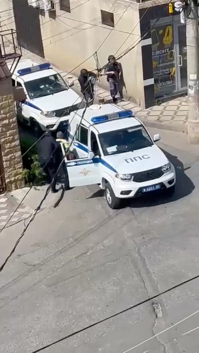 RUSSIA-SHOOTOUT/ <YONHAP NO-5698> (via REUTERS)