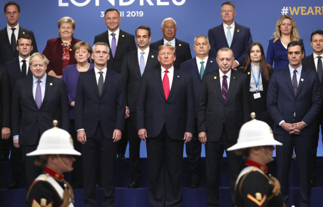 ADVANCE TO GO WITH STORY NATO Summit Spending