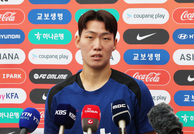 질문에 답하는 강상윤