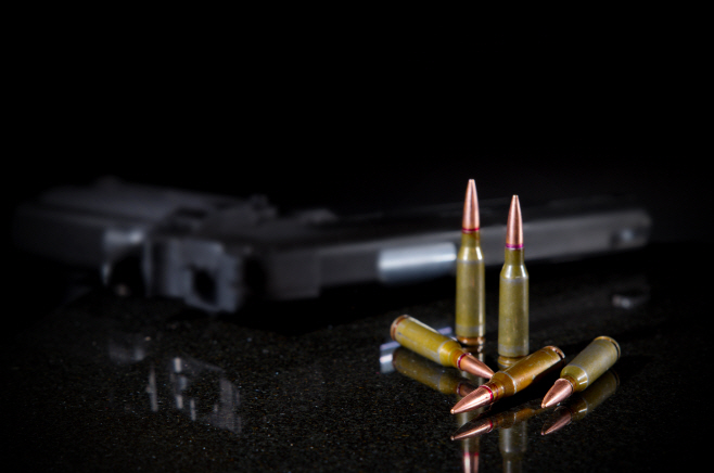 Ammunition cartridges on black