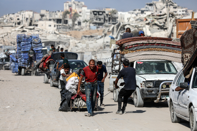 MIDEAST-GAZA-PALESTINIAN-FLEEING