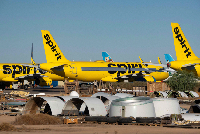 US-SPIRIT-AIRLINES-PLANES-SIT-PARKED-AT-PHOENIX-GOODYEAR-AIRPORT
