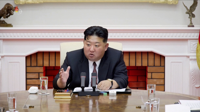당 제9기 3차 정치국회의 주재하는 김정은<YONHAP NO-4045>