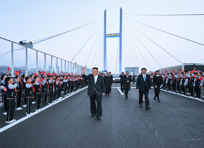 CHINA-LIAONING-DANDONG-WANG HUNING-DPRK-KIM JONG UN-VISIT (CN)